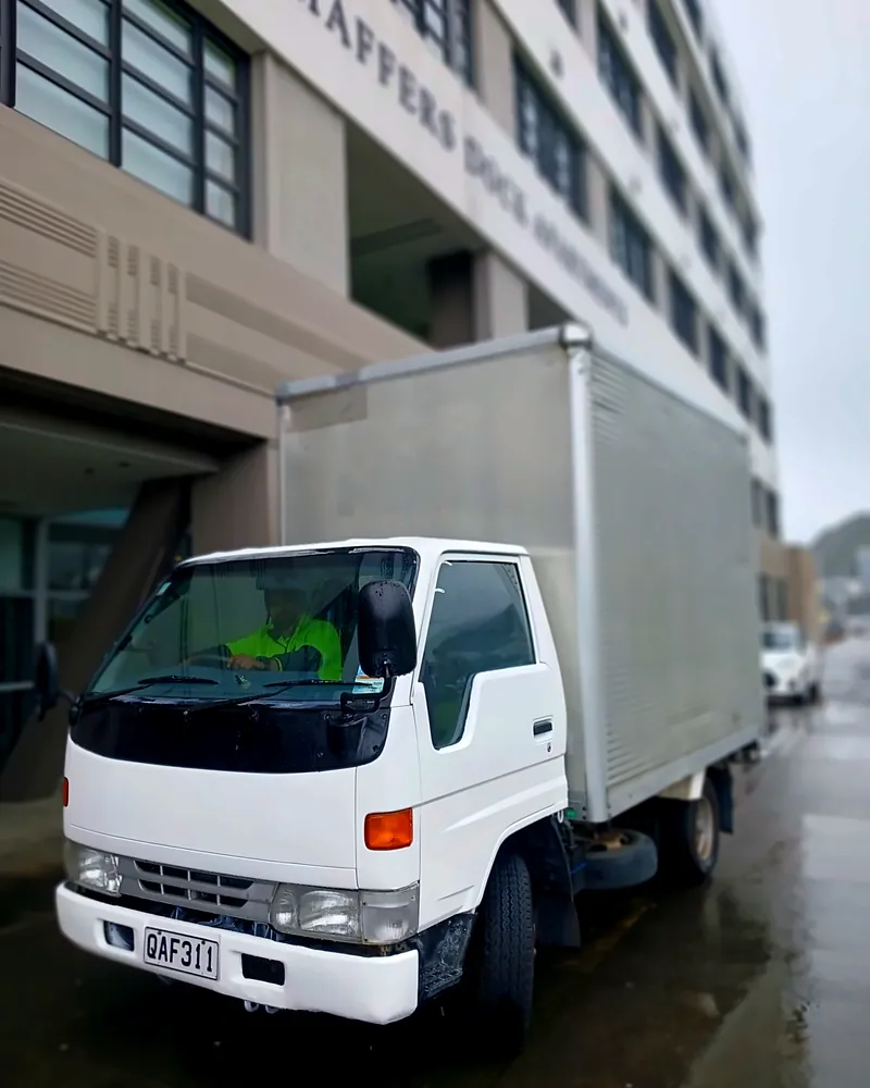 Rapid Transport Services truck parked on a city street